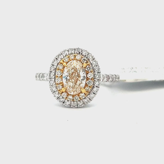 Video of a 1.88cttw Oval Cut Yellow Diamond Engagement Ring | 18k White Gold